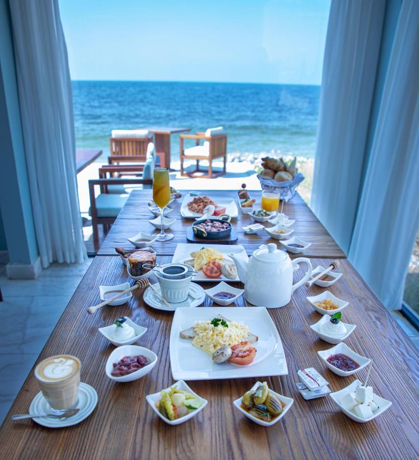 אג'מן Caravana Beach Resort Al Zorah מראה חיצוני תמונה